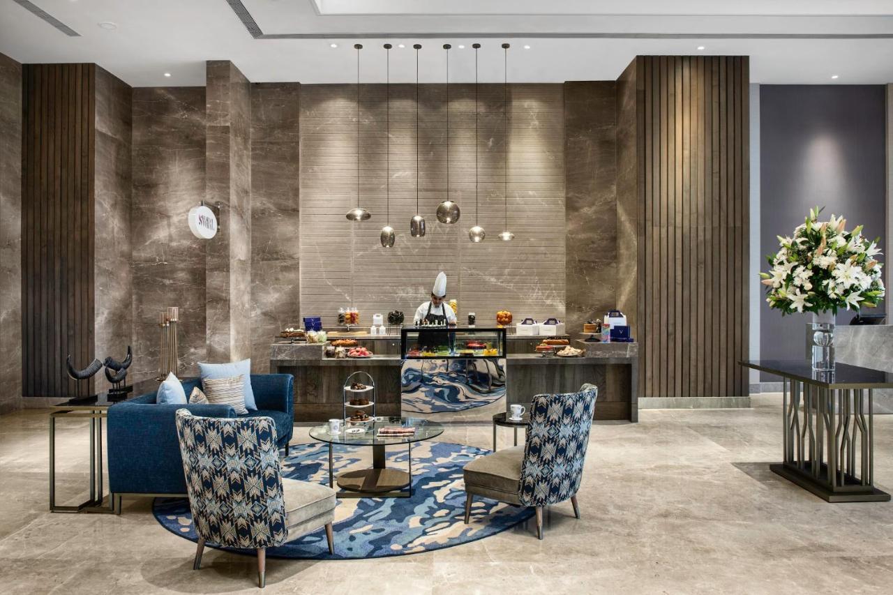 होटल Vivanta Dn Square